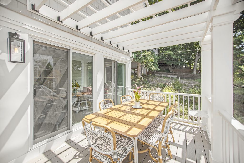 West Michigan lakeshore white pergola on white deck